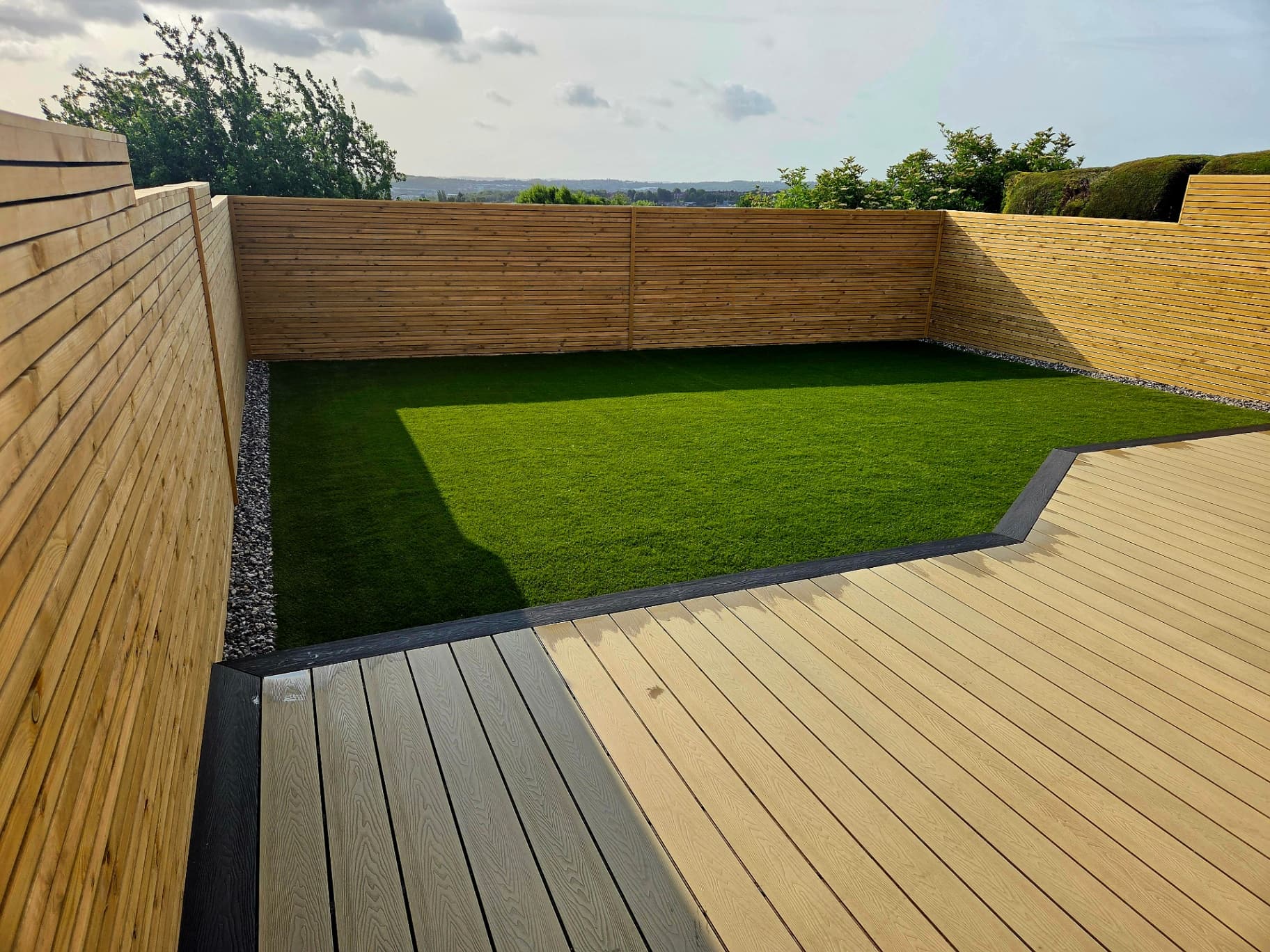 Artificial grass decking and fencing combination Sheffield