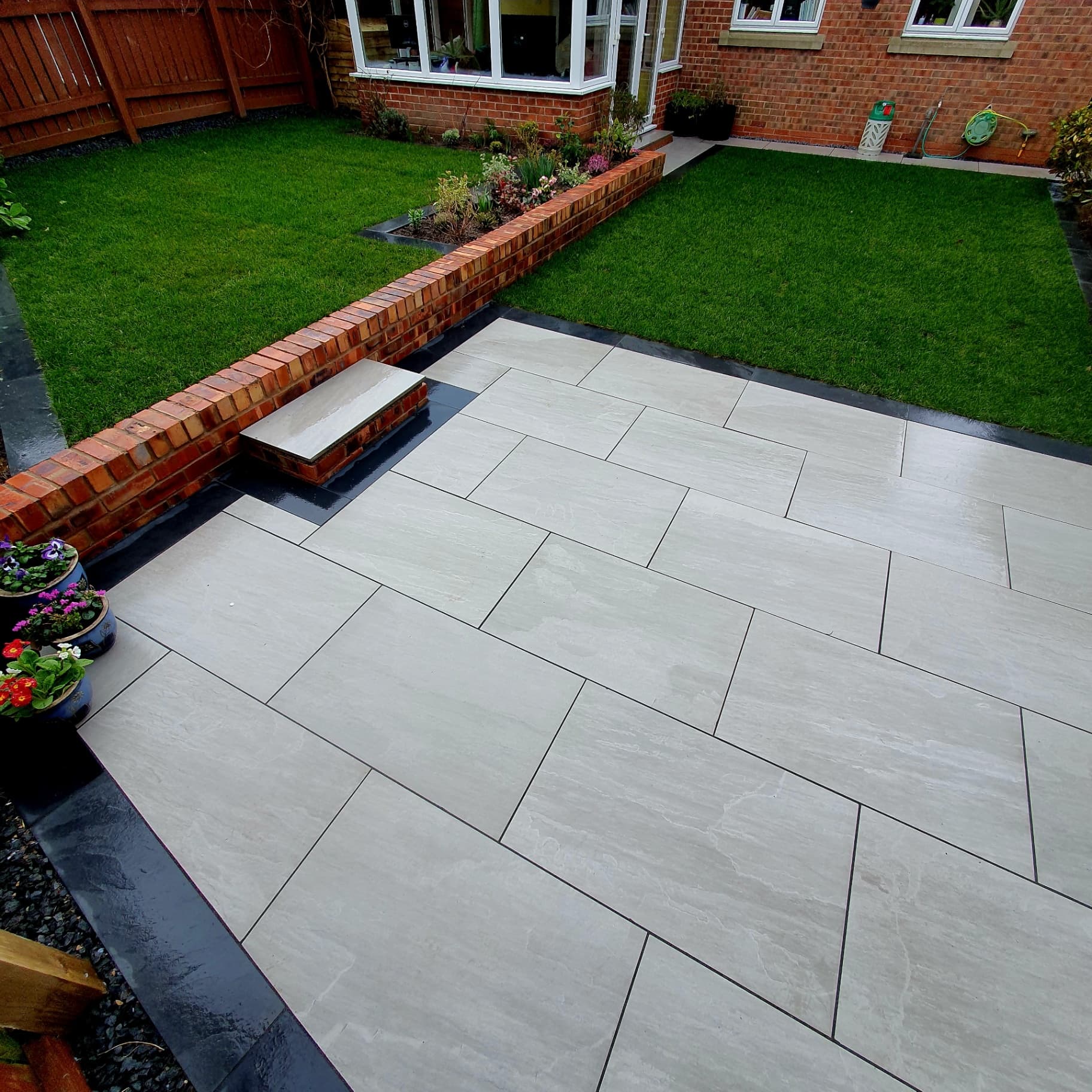 Porcelain paving with brick wall border Sheffield