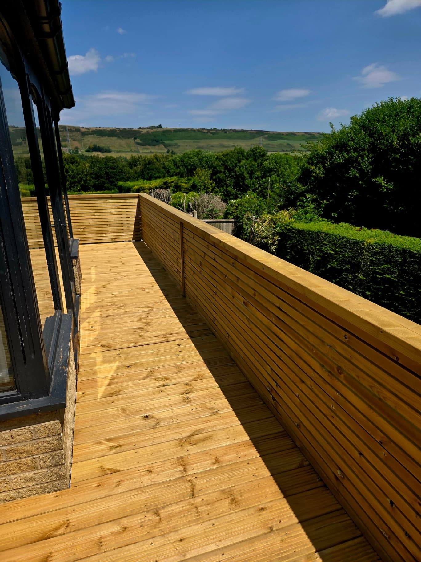 Raised decking with garden view Sheffield